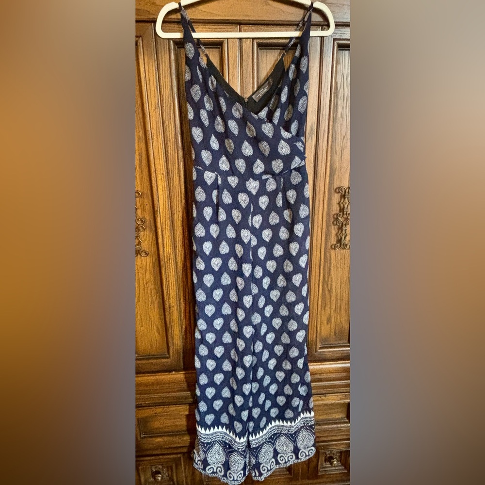Jumpsuit: Navy with cute pattern and adjustable straps and pockets